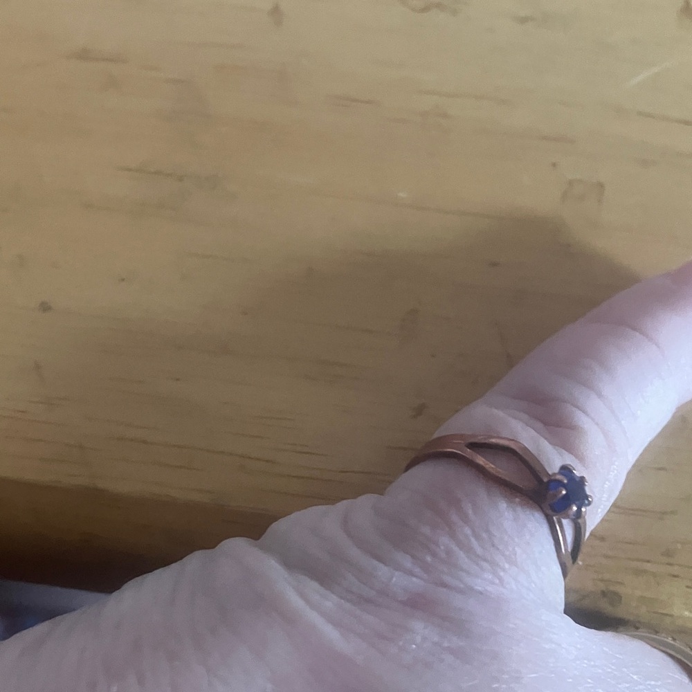 Elegant adjustable petite copper Ring with Blue Gem